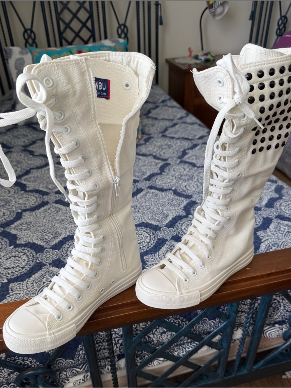 MIA White Knee-High Lace-Up Canvas Boots with Black Stud Accents